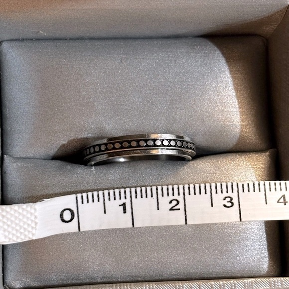 Macy’s Elegant Black and Silver Jewelry Fidget Ring with Matte Finish - Picture 2 of 3